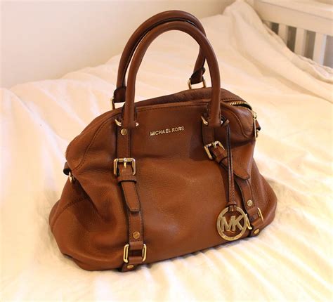 michael kors purses used|who buys Michael Kors purses.